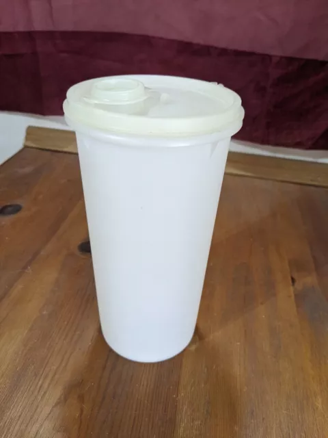 https://www.picclickimg.com/HQQAAOSw-59g7d~V/Vintage-Tupperware-261-14-Beverage-Storage-Container-W-Lid-Used.webp