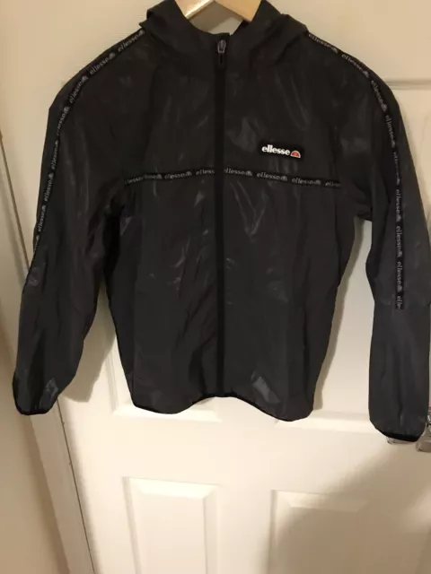 Ellesse tape lightweight hotsell reflective jacket junior