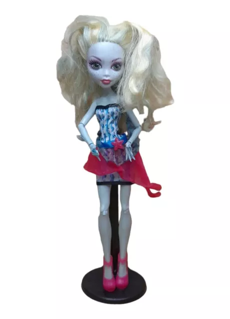Monster High Lagoona Blue Fashion Doll with Colorful Streaked Hair,  Accessories & Pet Piranha