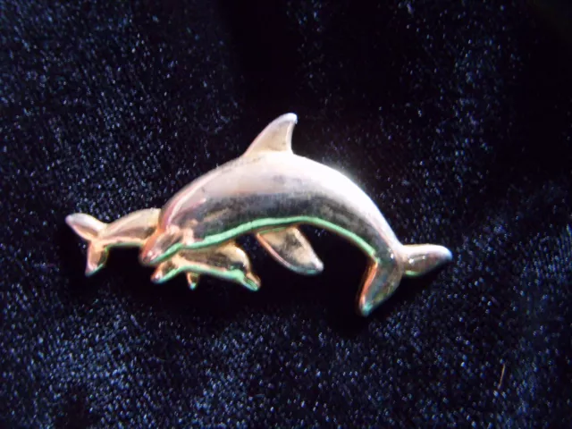 Gold tone dolphin mother and calf brooch