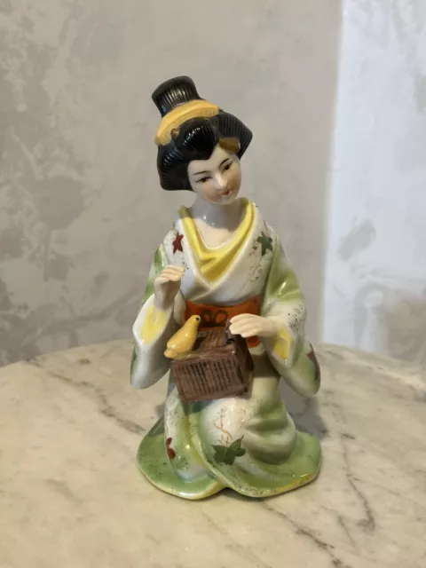 Vintage Japanese  Hand painted Porcelain Figurine Geisha & Bird