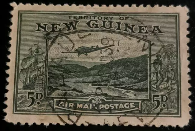 New Guinea: 1939 Plane over Bulolo Goldfield - New Design.. (Collectible Stamp).