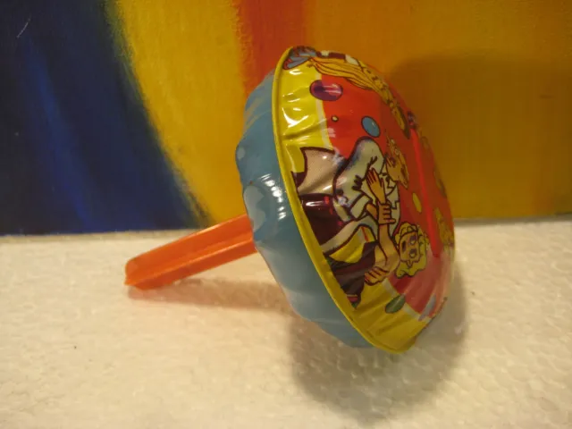 Plastic & Litho Tin New Years Eve Rattle Noisemaker with Slightly Saucy Graphics