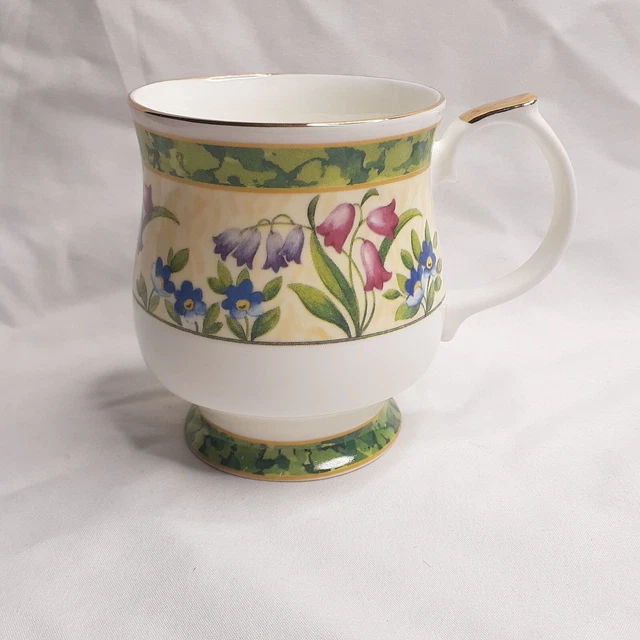Taza de té Queen's flores de primavera hueso fino china mango y borde dorado hecho en Inglaterra
