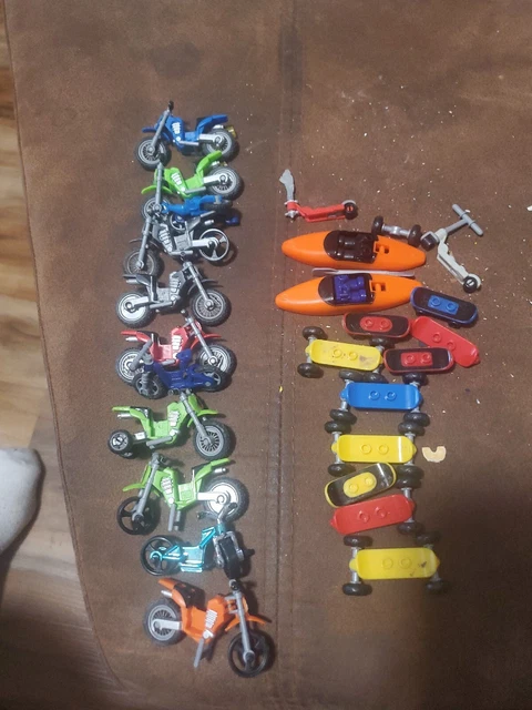 Lot Of Mini Legos Dirtbikes,skateboards, and Kajaks