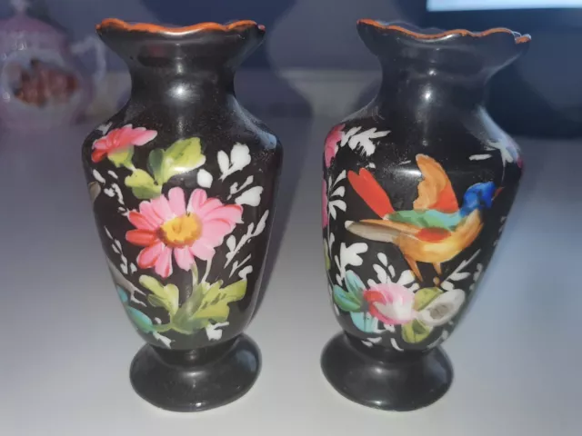 Pair of miniature French vases black with flowers and bird