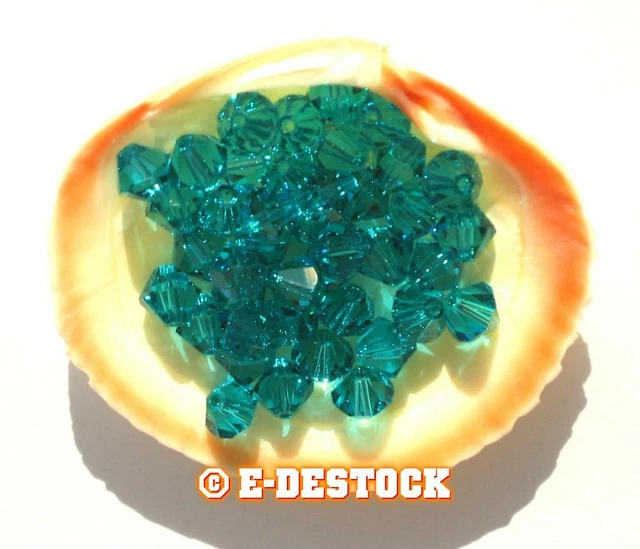25 Perles Toupies 4mm en cristal Swarovski  BLUE ZIRCON