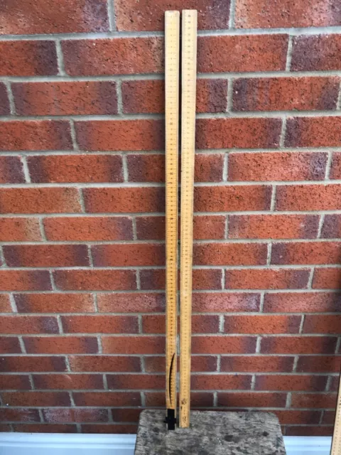 A pair of Vintage Wooden School Metre Rulers