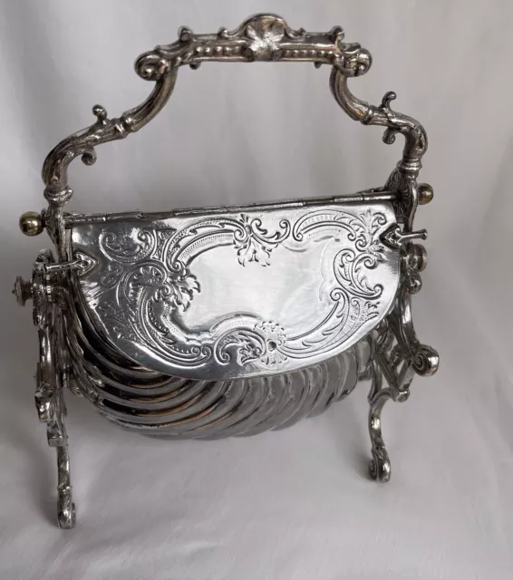 Antique biscuit box ,silver plated.Double opening . Circa 1890. Good condition