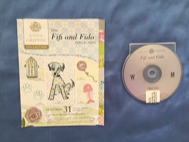 Máquina de bordar Anna Griffin CD FIFI y diseño FIDO 31