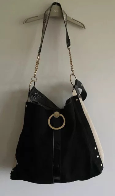 Black oversized ring front slouch bag river island 2025