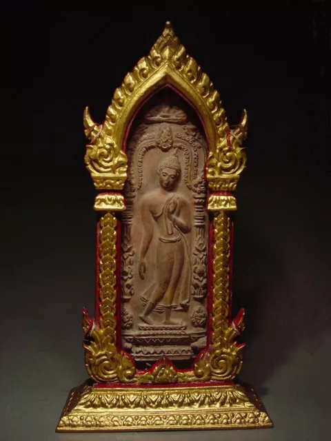 CLAY BUDDHIST VOTIVE PLAQUE 'PHRA LEELA' SHRINE, SUKHOTHAI PROVINCE. 19th C.