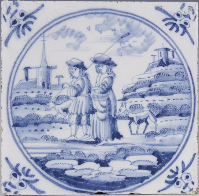 Nice Dutch Delft Blue tile, couple in a landscape, 18th. century.
