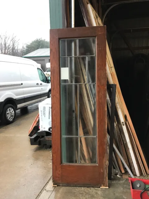 An 518 Antique oak beveled glass passage door missing veneer 30 x 84x 1 3/4”