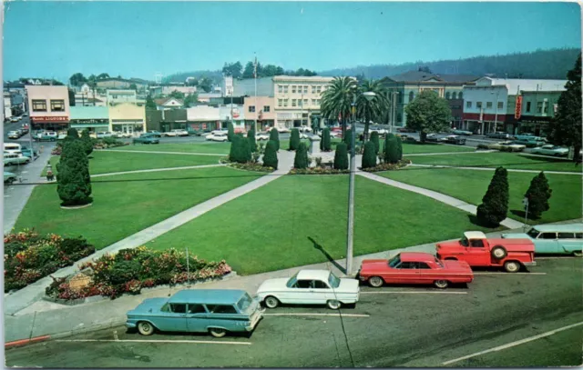 1960s CA Postcard The Plaza Flower Gardens Arcata 1967 Old Cars Parked Square