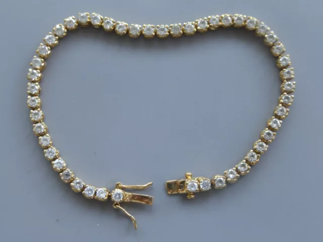 bracelet rivière plaqué or poinçon 11gr 21cm  zirconiums  tbé