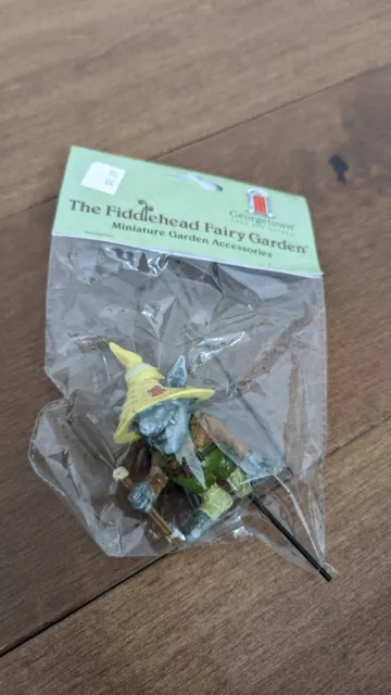 The Fiddlehead Fairy Garden miniature troll with broom