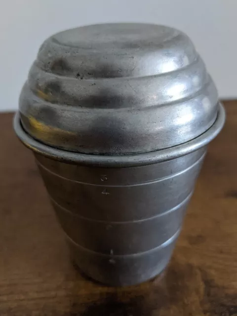 https://www.picclickimg.com/HjUAAOSwX8ZlGf4Q/MIRRO-Aluminum-Measuring-Cup-Shaker-With-Lid-1.webp