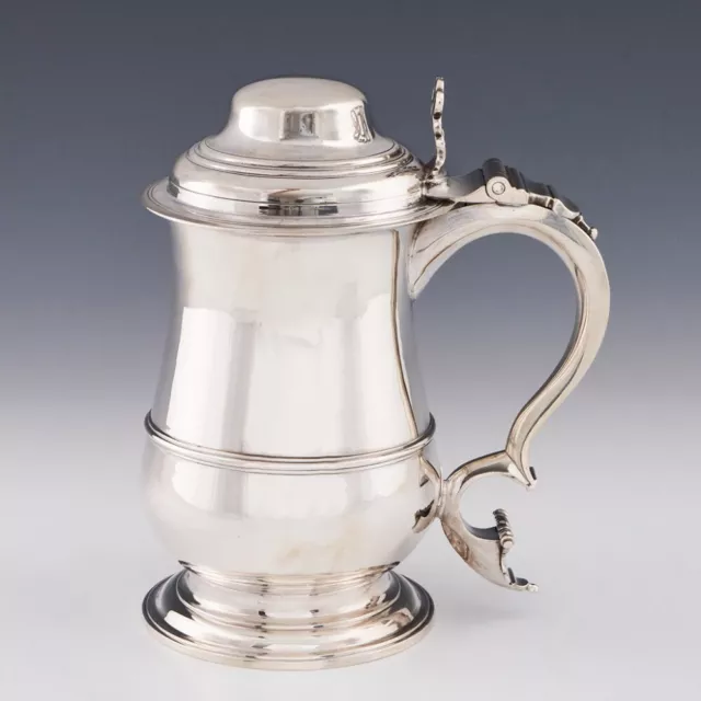 A George III Sterling Silver Domed Lidded Quart Tankard London 1766