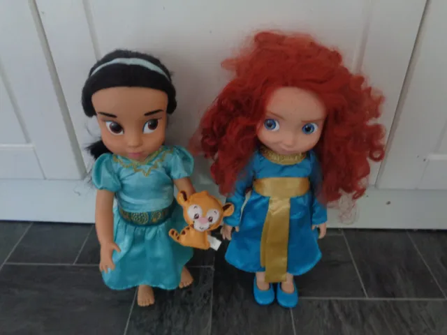 disney store-princess animator dolls x 2- jasmine (aladdin) + merida (Brave)