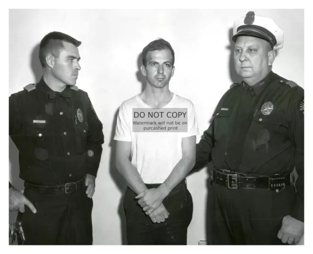 Lee Harvey Oswald In Police Custody John F. Kennedy Assasination 8X10 Photo