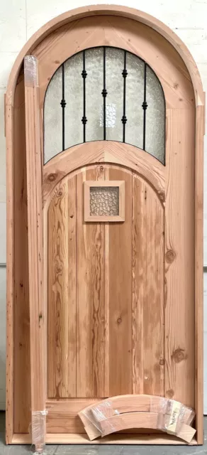 Rustic reclaimed lumber arched top door solid wood story book castle glass iron