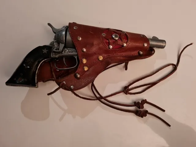 ancien revolver a pétard jouet DBGM pistolet cowboy