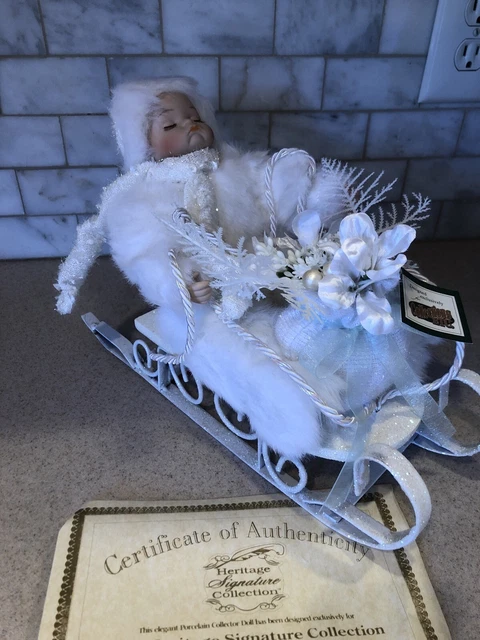 W Heritage Signature Collection - Porcelain Doll in Sleigh - Winter Baby - COA