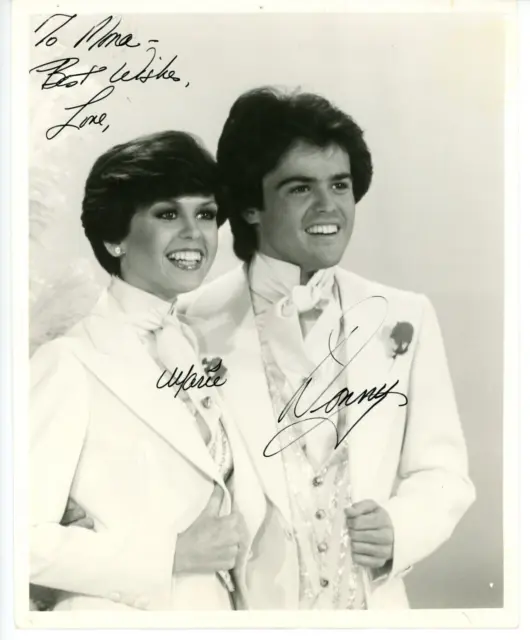 Autographed 8x10 Photo Singing Duo Donny & Marie Osmond