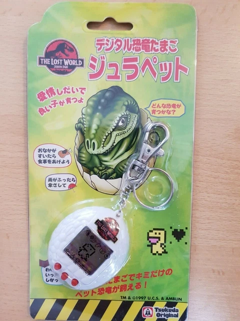 JURASSIC PARK THE Lost World Green Tamagotchi Working/Tested Damaged