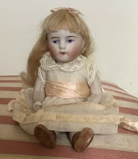 German? Bisque Sitting Doll