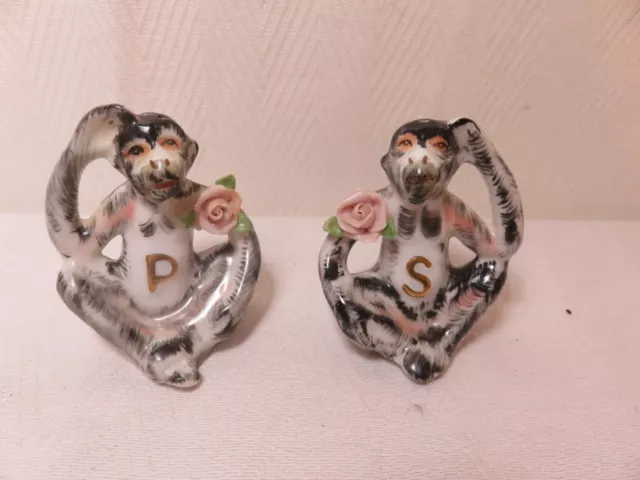 Vtg Japan monkey with flowers salt and pepper shakers