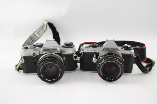 2 x SLR FILM CAMERAS Inc. Olympus OM10 & Pentax ME Super w/ Both Lenses