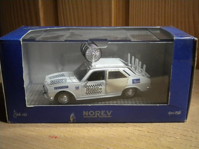 Voiture Miniature Peugeot 504 Assistance 1975 Tour de France Vélo Norev 1/43