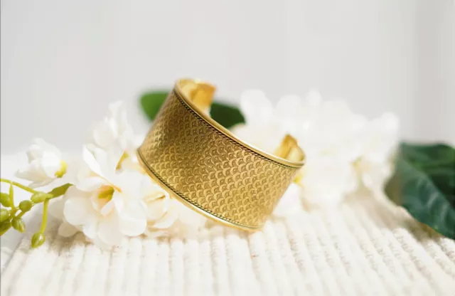 Gold plated cuff made from Brass with  fish scale design framed in woven border