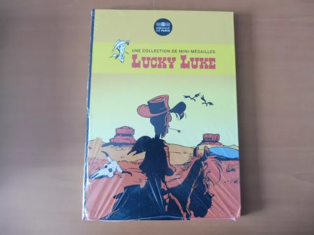 Superbe  1 Medaille + Album Collector Les 75 Ans Lucky Luke  (Neuf)