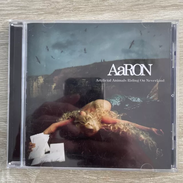 Aaron | Artificial Animals Riding On Neverland | Cd | Très Bon Etat