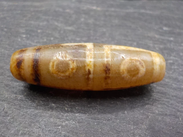 An Agate Dzi bead with a 4 Eye pattern from Tibet / Nepal.