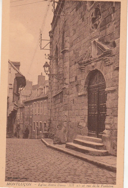 Carte postale ancienne ALLIER MONTLUCON église Notre-Dame rue de la fontaine