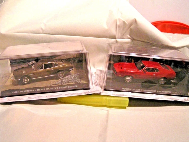 UH 1/43 - JAMES BOND 007 = LOT DE  1 x MUSTANG MACH 1  +  1 x ASTON MARTIN DBS