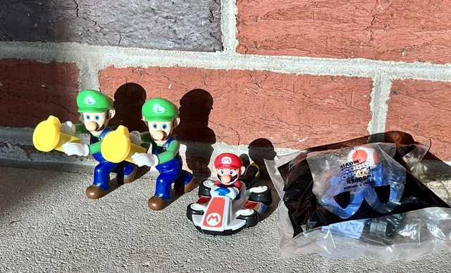 LOT OF 4 McDonald s Happy Meal Super Mario Bros Movie Mario Cart Toys 