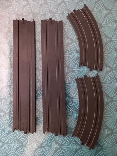 Lot de 16 rails courbes et droits pour circuit de voitures électrique TYCO