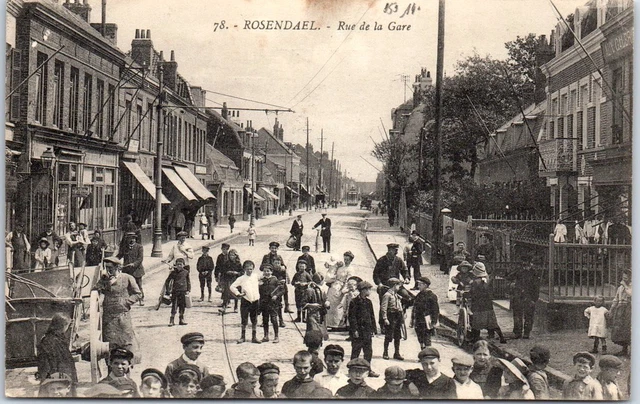 59 ROSENDAEL - la rue de la gare animee.