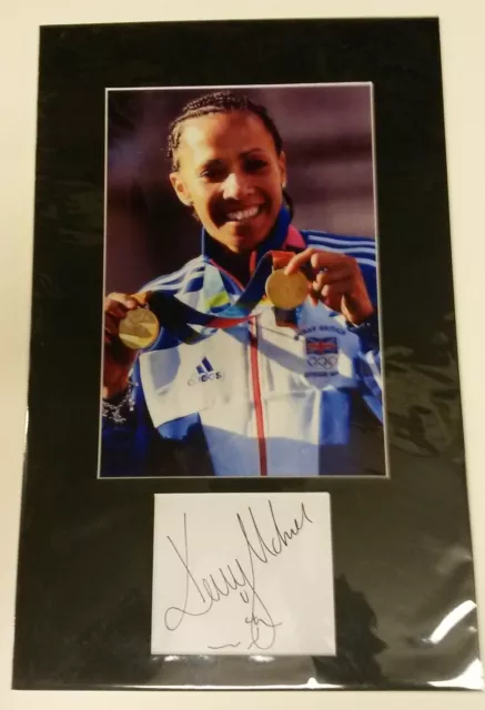 HOLMES, KELLY Kelly Holmes Hand Signed Autograph 2010