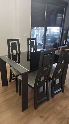 mesas y sillas de comedor y mesa centro wengue. Madera maciza 