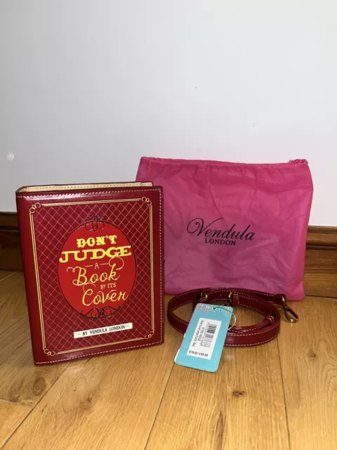 Dont judge a book by its cover by vendula London ( Clutch bag)