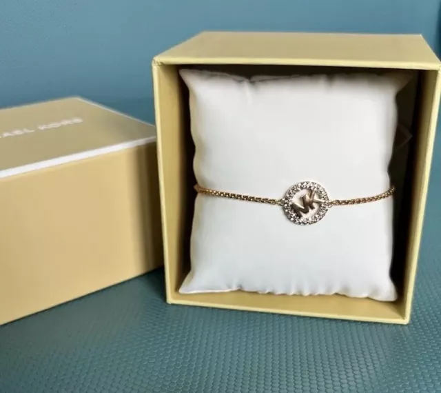 NWT MICHAEL KORS Gold-TONE BRASS CRYSTAL PAVE LOGO SLIDER BRACELET MSRP $85.00