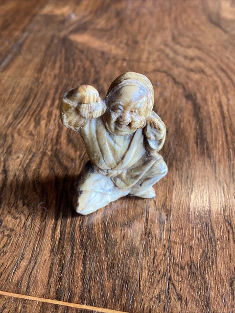 Antique Horn Japanese Netsuke Of A Buddha.