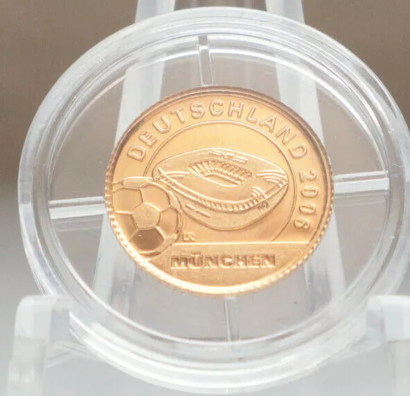 LIBERIA: 10 Dollars 2004: FUSSBALL-WM 2006: STADION MÜNCHEN 1/25 oz 585 GOLD, PP 2