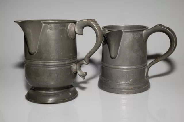 Old pewter hand made pint jugs